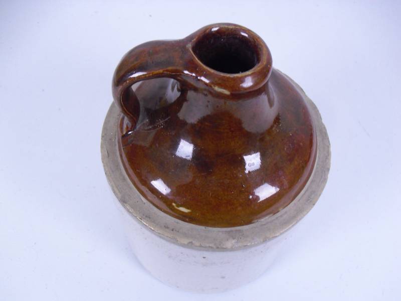 lot 44 image: Vintage Red Wing Whiskey Jug