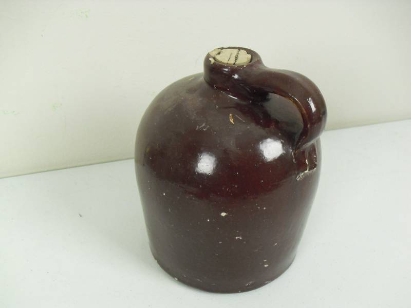 lot 45 image: Vintage Brown Salt Glaze Whisky Jug