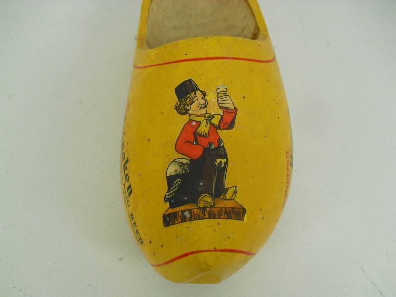 lot 46 image: Vintage Heineken Beer Wood Clog