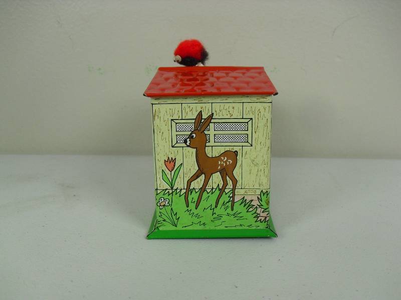 lot 62 image: Vintage Tin Litho Dog Tongue Mechanical Bank