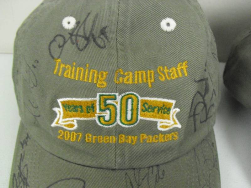lot 91 image: Pair Of 2007 Green Bay Packers Training Camp Staff Autographed Hats