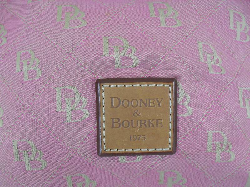 lot 107 image: Dooney & Bourke Monogram Purse