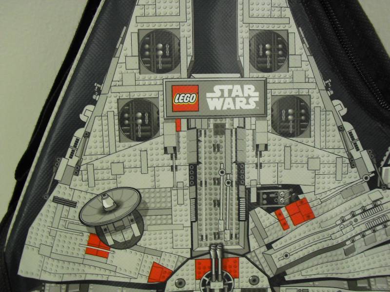 lot 124 image: Small Bin Of All Legos And Millenium Falcon Lego Case