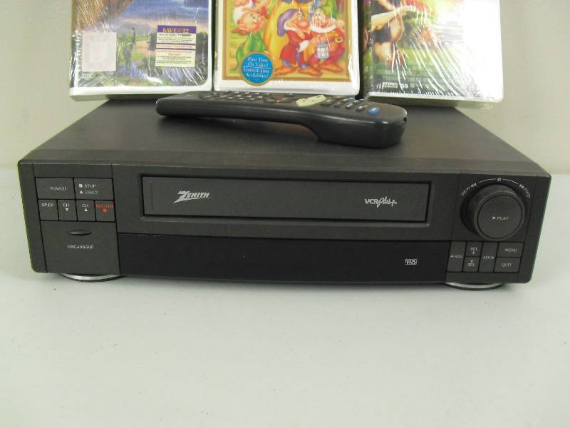 lot 157 image: Zenith VCR With Remote and New Kids Disney VHS