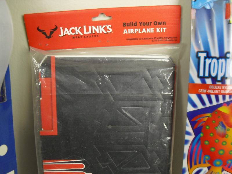 lot 176 image: Lot of New Nylon Kites and Jack Links Plane Blue Angels