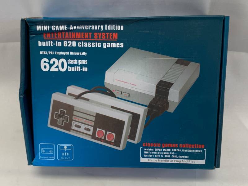 lot 31 image: Mini Entertainment Game System with 620 Games