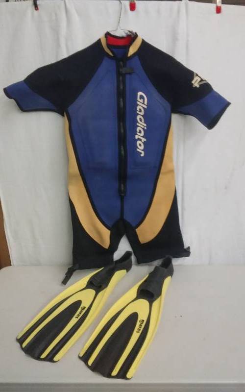 lot 21 image: Gladiator Wet Suit Size XL, Pair Mares Swim Fins Size 6 12-7 12