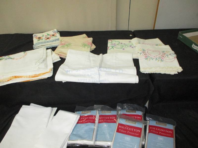 Nice Pillow Protectors unopened, king and standard and lots of other pillow cases sticked on