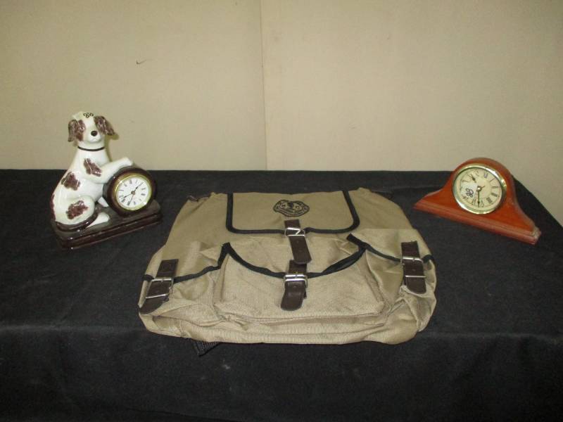 2 clocks and a new bag