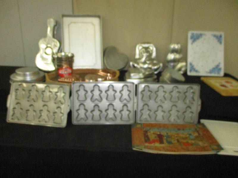 Lots  baking pans, guitar, rabbit, tiered, cutting boards, plae mats, stackable pails
