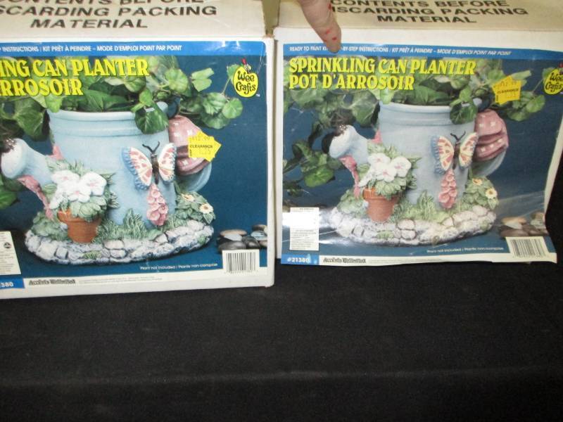 2 ceramic planters still in the boxes