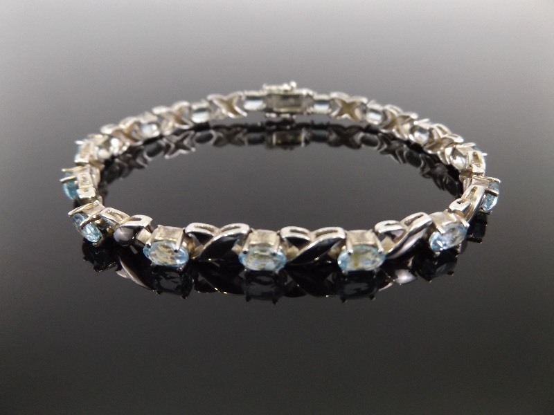 .925 Sterling Silver Faceted Blue Topaz Bracelet