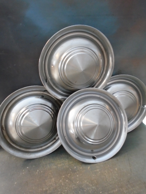 lot 52 image: Vintage Hubcaps