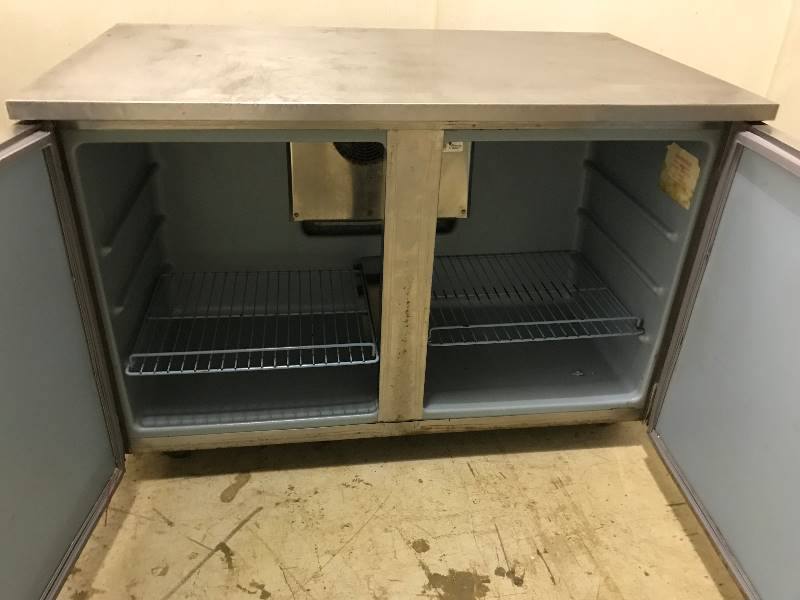 lot 33 image: Delfield, Mod #VC4048, two door under counter refrigerator, NSF, SN 247015-7, caster mounted, 115 volts, 4 amps