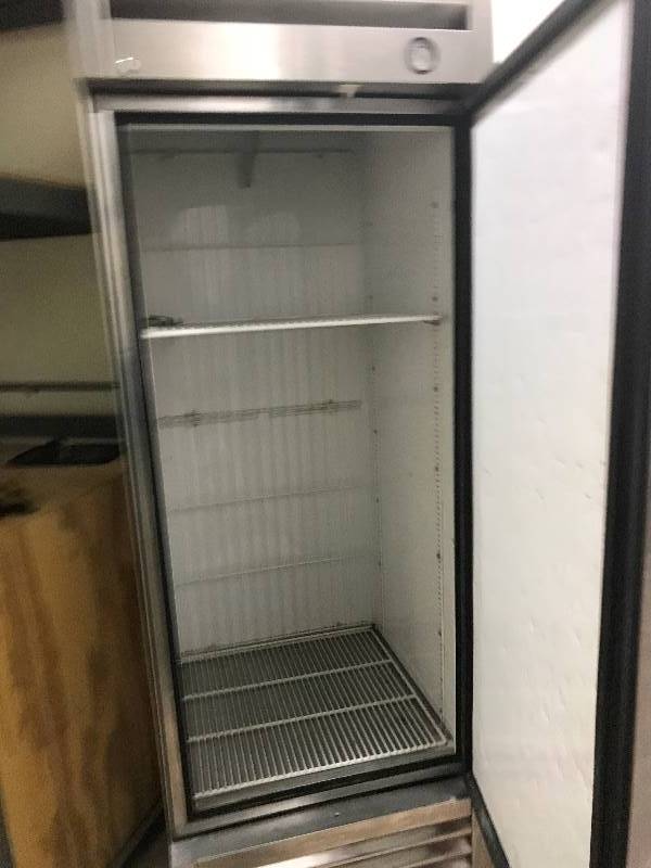 lot 32 image: True Stainless Steel Freezer On Wheels Model T-23F-1Runs Freezes with Shelves