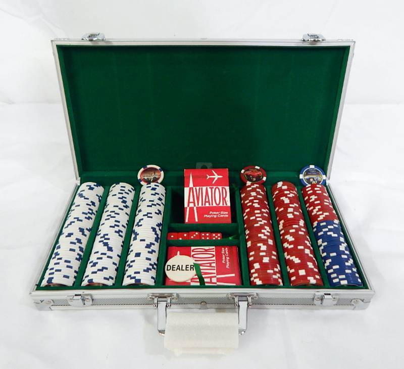 lot 124 image: 300 Chip Aluminum Poker Chip Case with Limited Edition Ferrari and Shelby Cobra Chips, Playing Cards and Dice