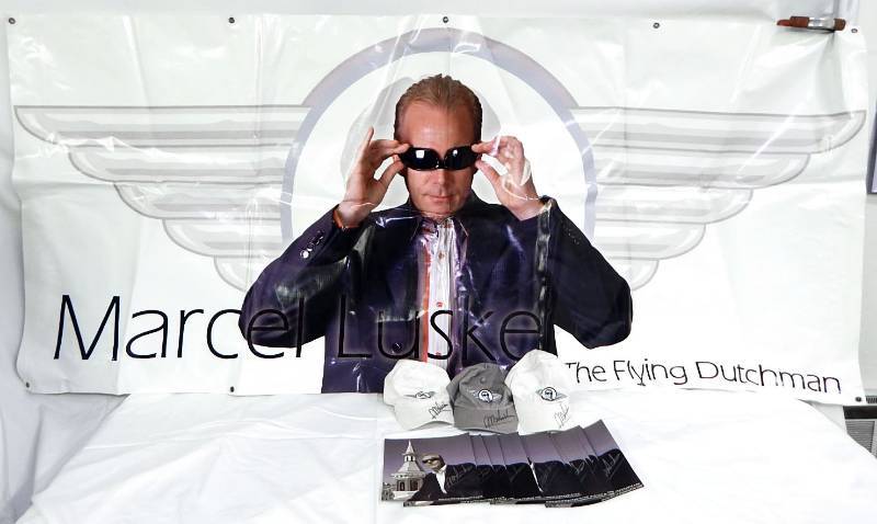lot 155 image: Professional Poker Player Marcel The Flying Dutchman Luske Banner and Autographed Memorabilia Lot