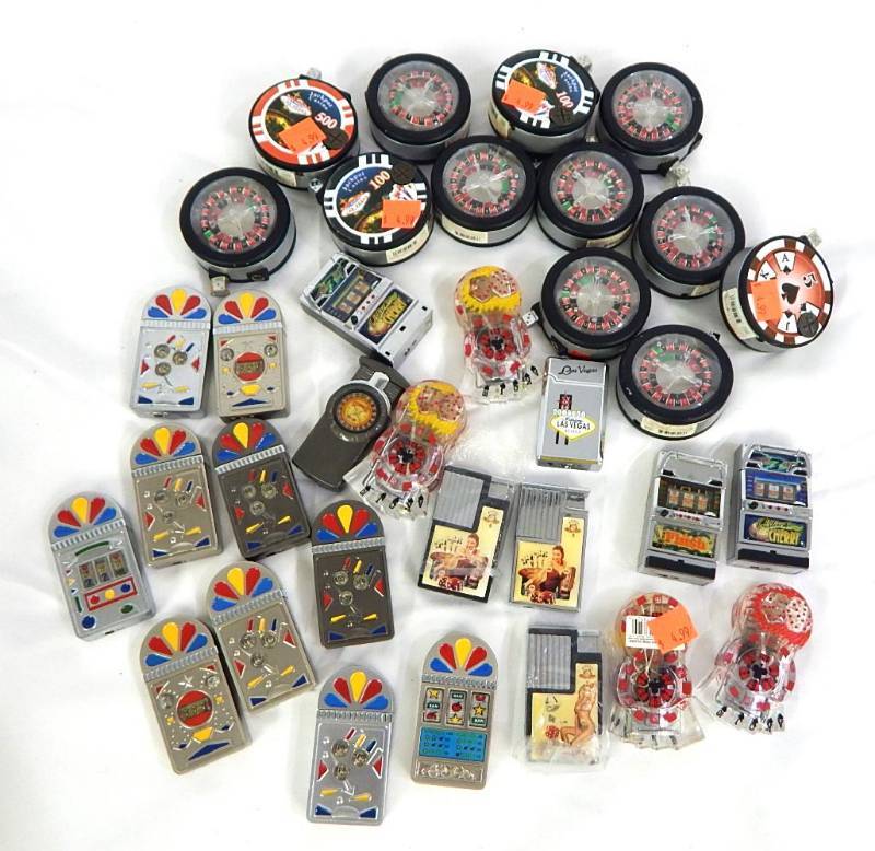 lot 16 image: Lot of 34 Casino and Gambling Themed Lighters