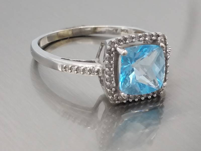 Blue Topaz and Diamond Ring in 10k White Gold