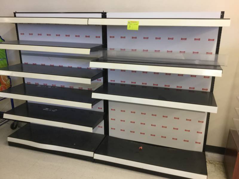 lot 3 image: 2- 4 for an 8 run of shelving 