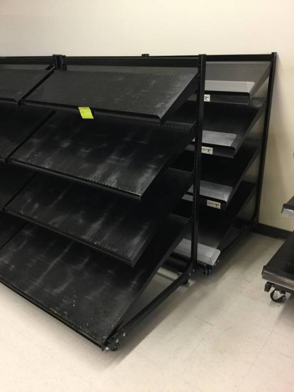 lot 11 image: 4 Tier Merchandising Shelf2 - Shelving Sections in this Lot