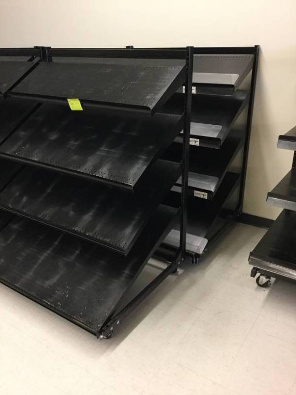 lot 13 image: 4 Tier Merchandising Shelf 2 - Shelving Sections in this Lot