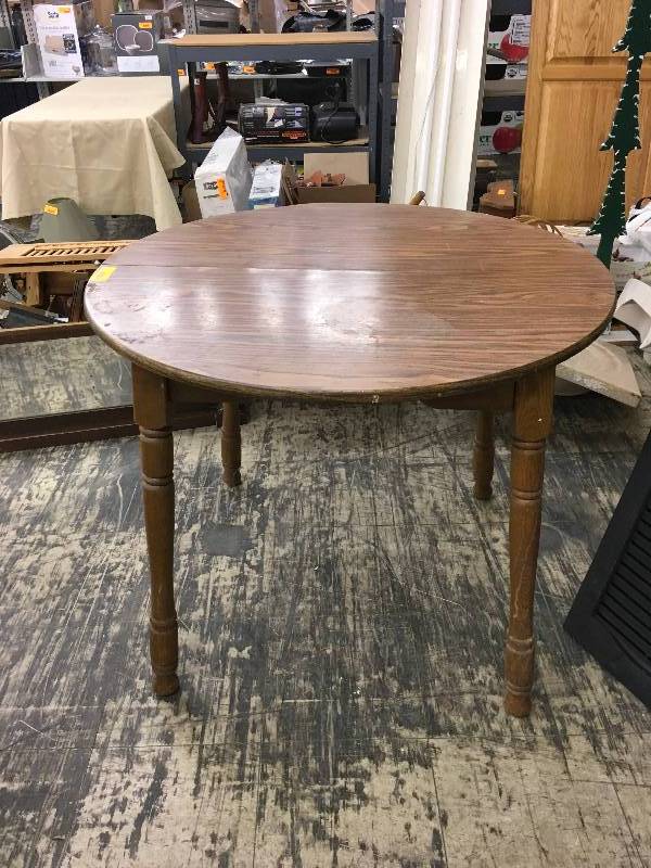 lot 58 image: Wooden Round Table