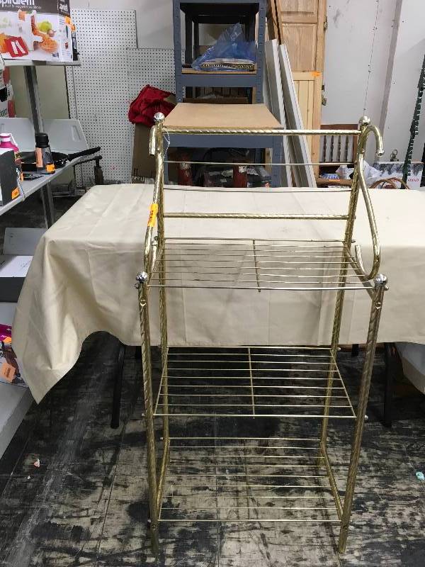 lot 77 image: Gold Shelf