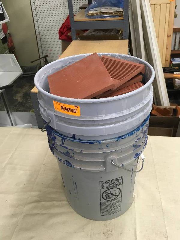 lot 89 image: Bucket Full Of Tiles