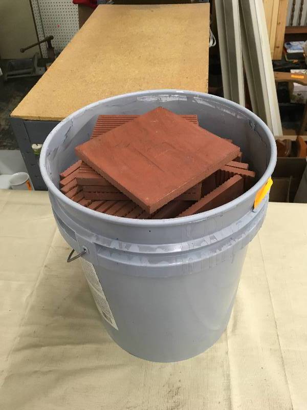 lot 90 image: Bucket Full Of Tiles