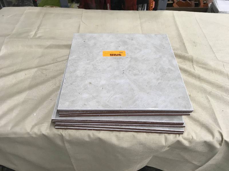 lot 102 image: 9 Athena Gray 12X12 Tiles