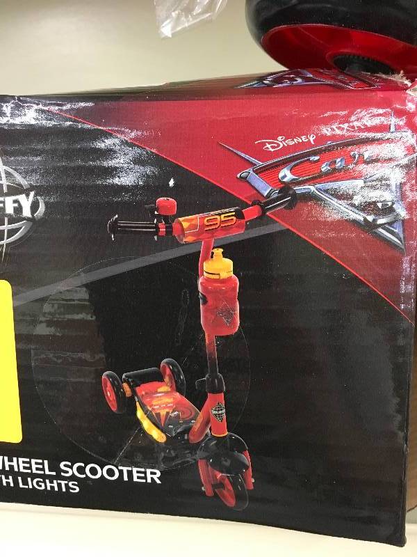 lot 63 image: Huffy Lightning Mcqueen 3 Wheel Scooter W Lights, Retail $34.99