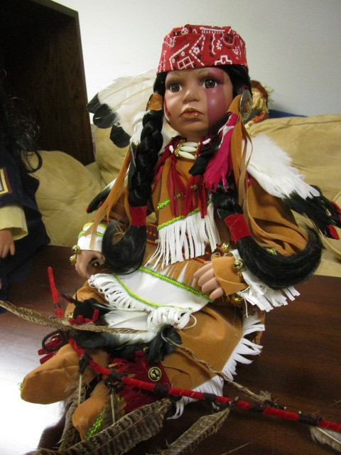 lot 103 image: NATIVE AMERICAN DOLL