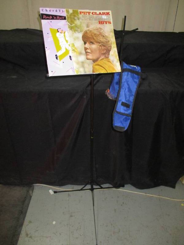 lot 15 image: Music stand and 2 music books