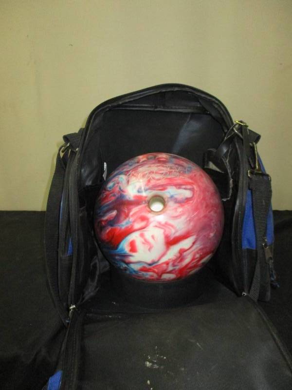 lot 73 image: Ebonite Zoom Glow Bowling ball and case