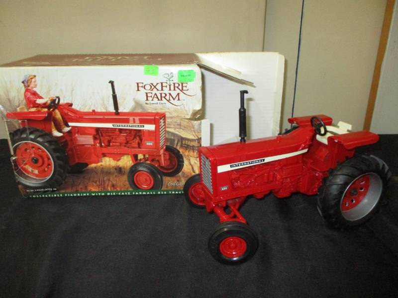 lot 93 image: International Foxfire Farm 826 Tractor still in box