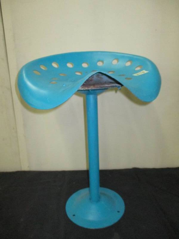 lot 104 image: Old tractor Seat Stool 19 Tall