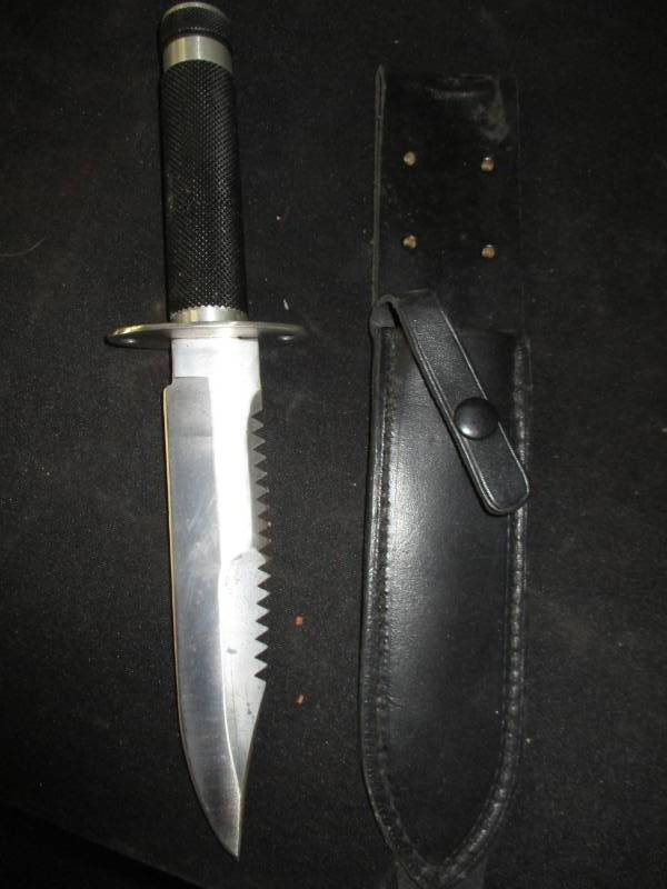 lot 143 image: Knife and holder