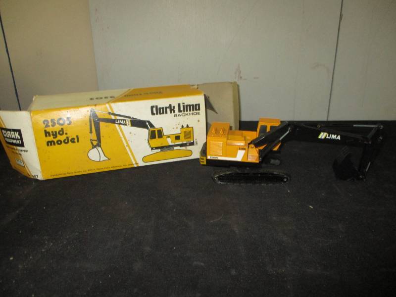 lot 144 image: 2505 hyd. Model Clark Lima Backhoe