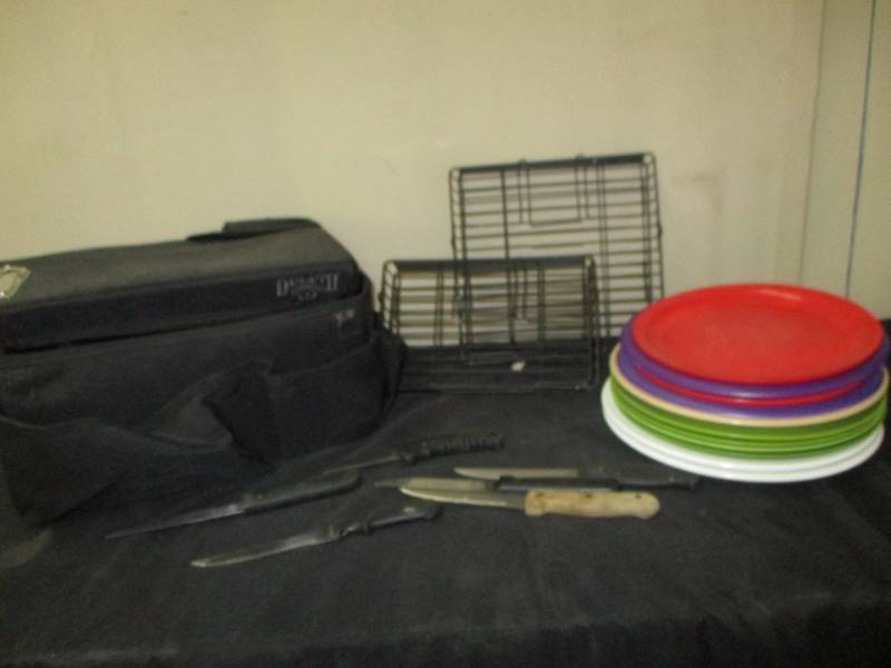 lot 166 image: Knives, plastic plates, Duluth Trading Co. carrier