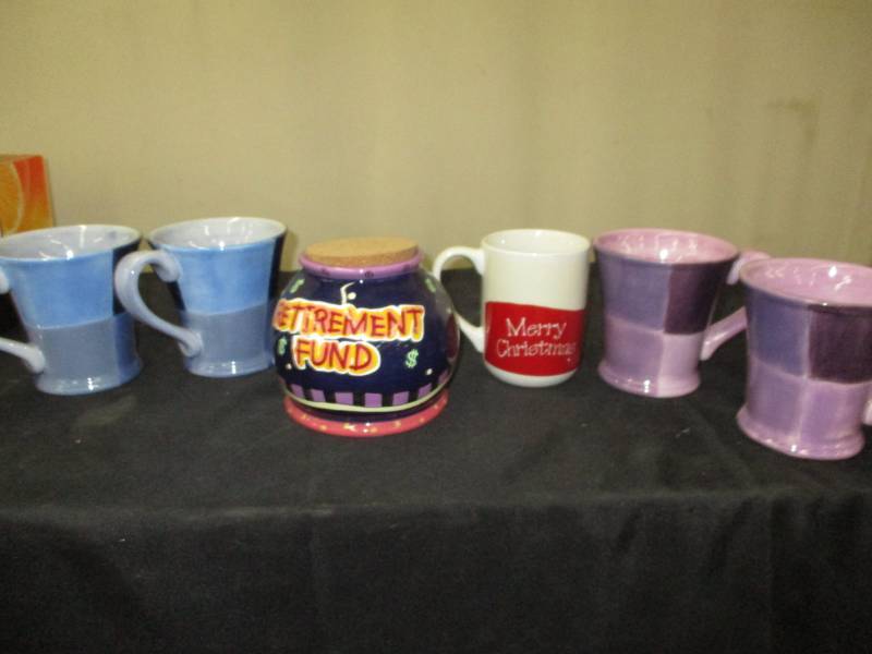 lot 169 image: 2 sets of matching mugs, retirement fund jar