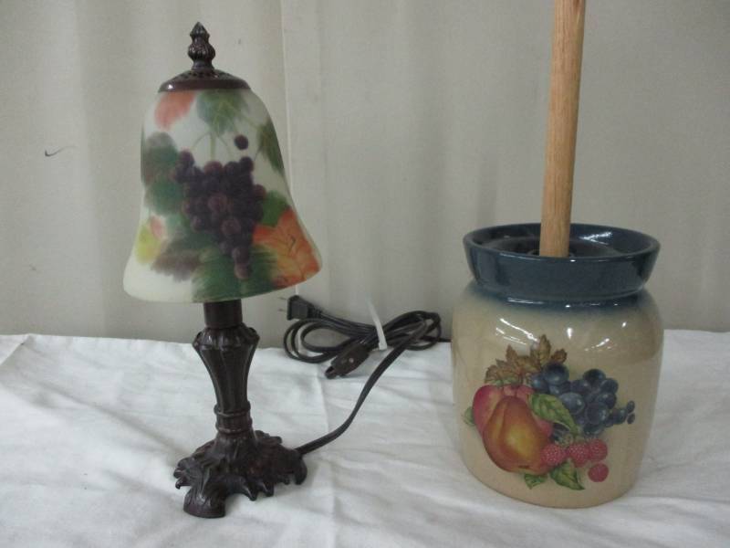 lot 194 image: Butter churn and lamp