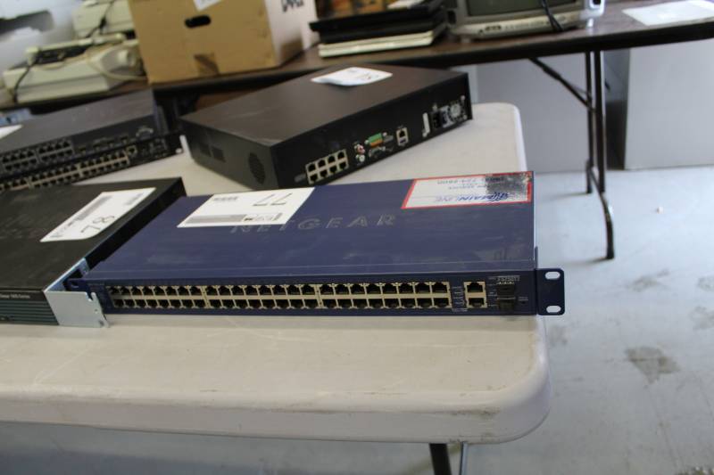 lot 77 image: Netgear Rack-Mount FS750T2 48-Port 10100 Base-TX Network Switch