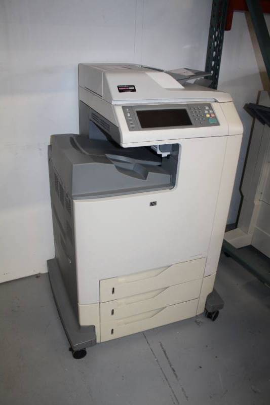 lot 7 image: HP Color LaserJet 4730mfp Printer
