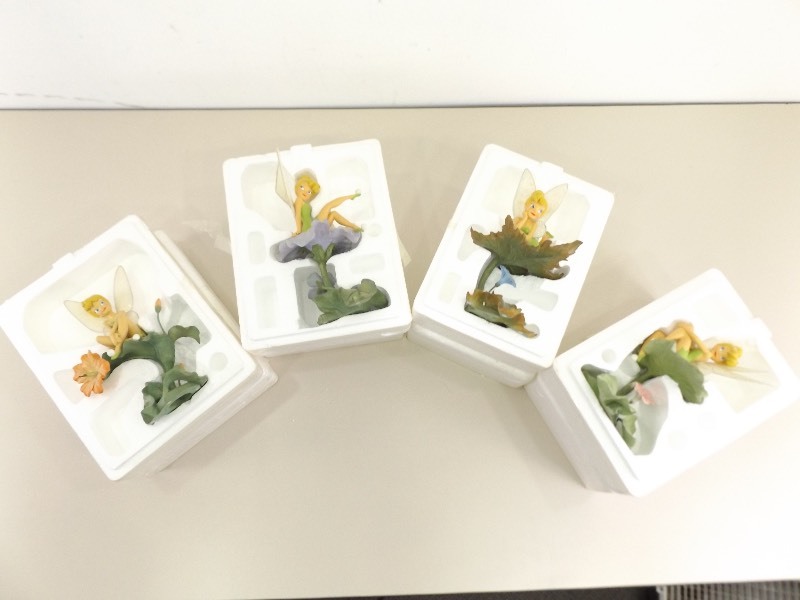 lot 14 image: 4 Bradford Exchange Tinkerbell Figurines 