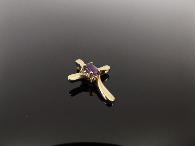 lot 27 image: 18k Yellow Gold Amethyst Diamond Accented Cross Pendant