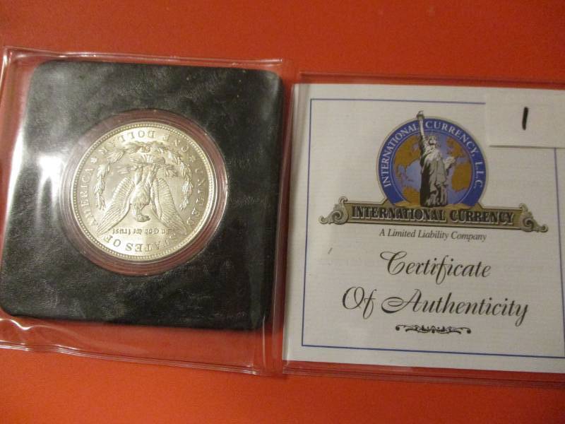 lot 1 image: 1921 Morgan Silver Dollar BU