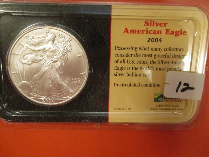lot 12 image: 2004 Silver American Eagle UNC