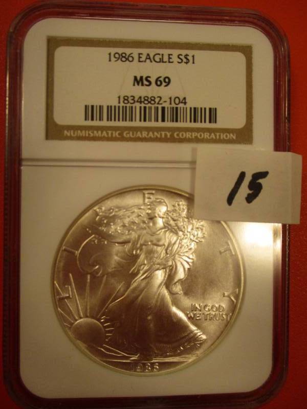 lot 15 image: 1986  Silver American Eagle MS69 1st Year