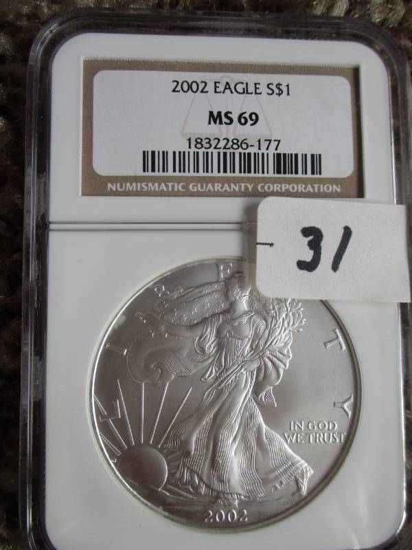 lot 31 image: 2002 Silver American Eagle UNC